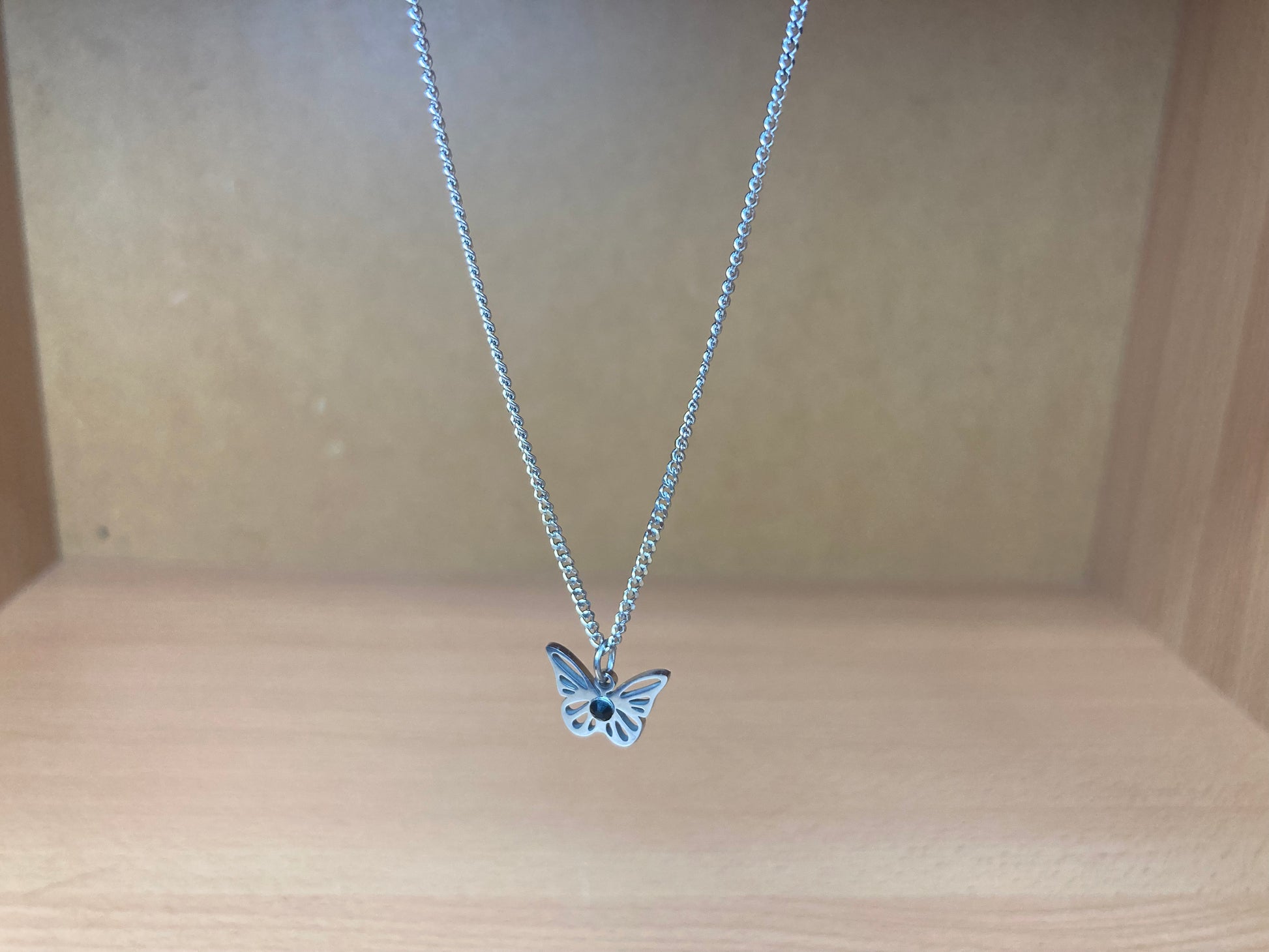 Tiny Treasures Seoul - Open Butterfly Surgical Steel Necklace Front View 2