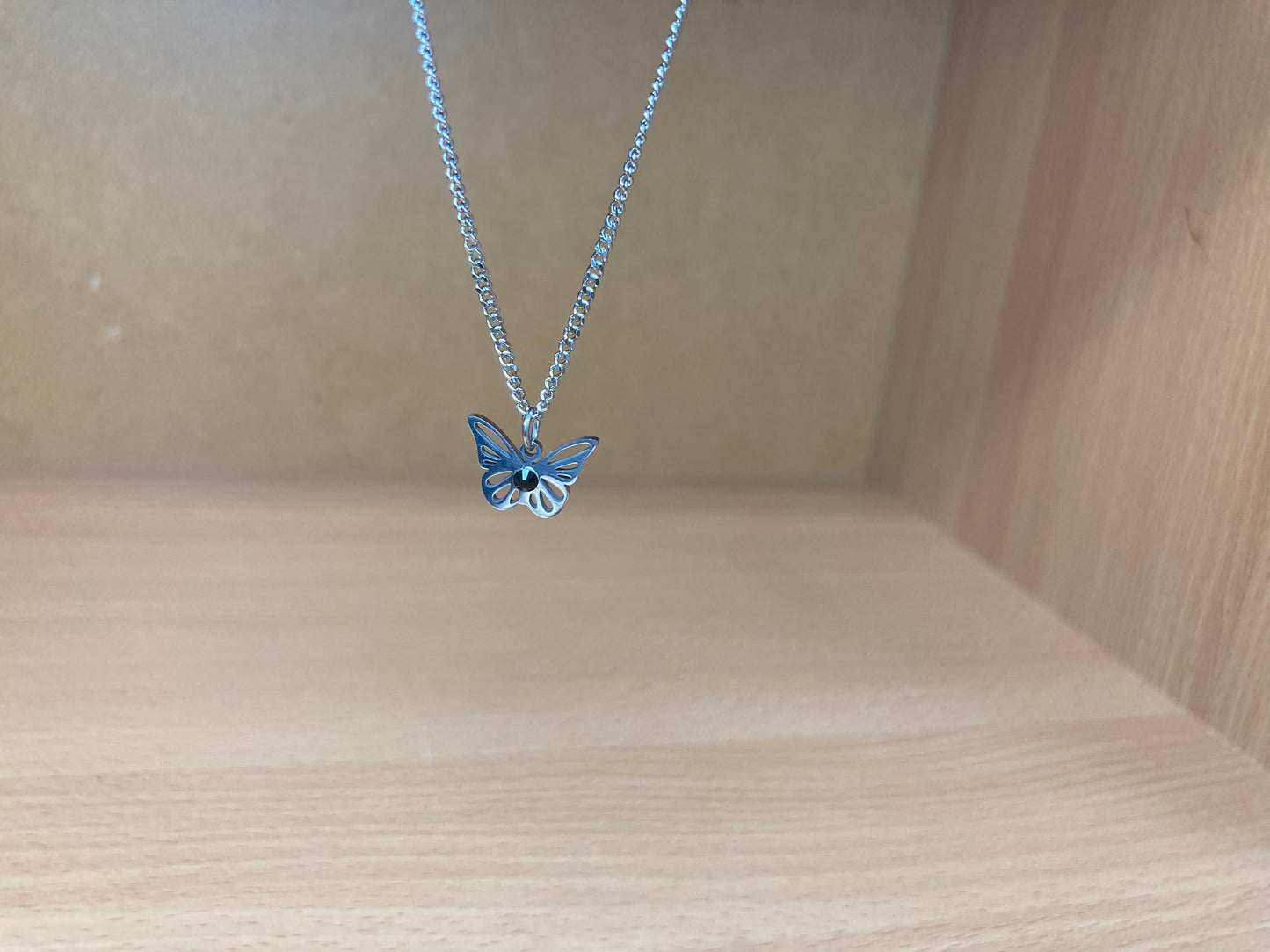 Tiny Treasures Seoul - Open Butterfly Surgical Steel Necklace Close up View