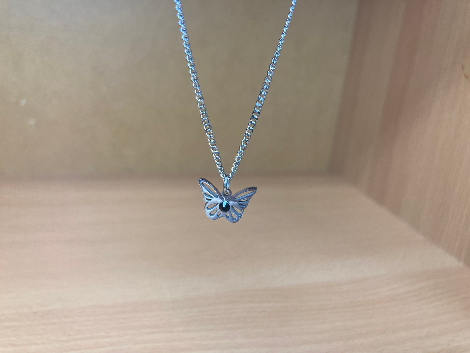 Tiny Treasures Seoul - Open Butterfly Surgical Steel Necklace Close up View 2