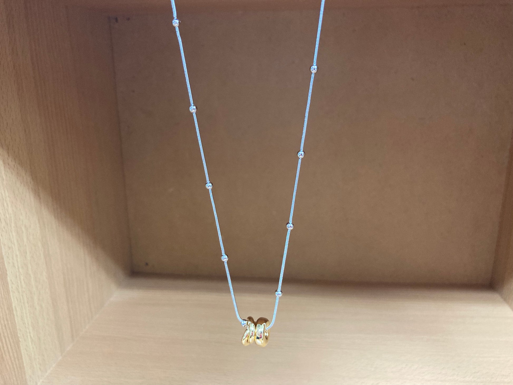 Tiny Treasures Seoul - Silver Chain Triple Gold Ring Necklace Front View 4