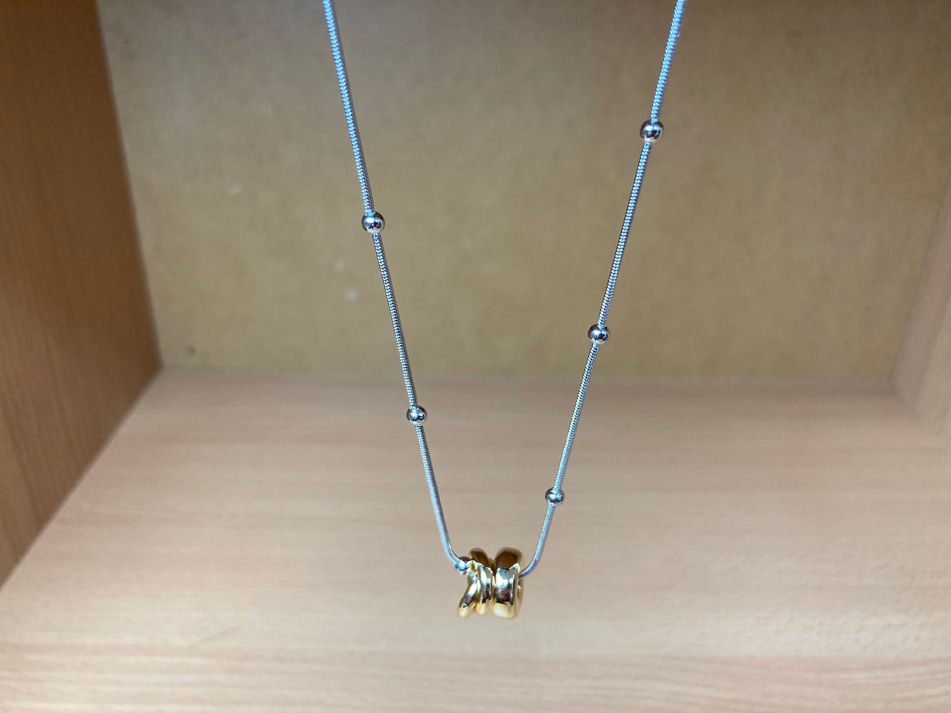 Tiny Treasures Seoul - Silver Chain Triple Gold Ring Necklace Front View