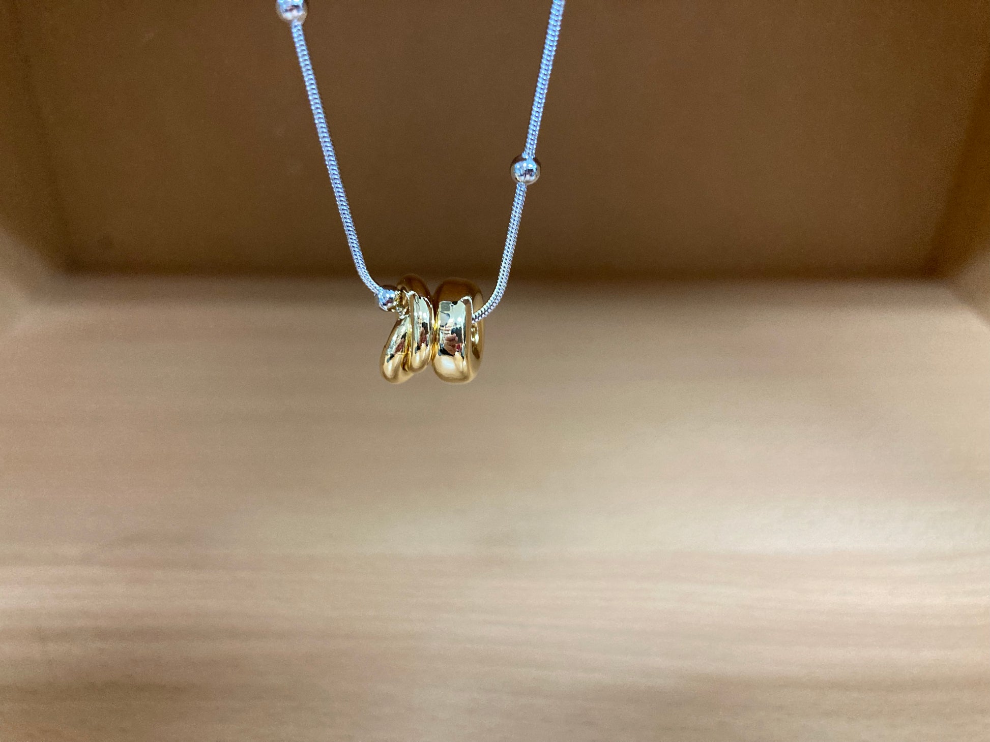 Tiny Treasures Seoul - Silver Chain Triple Gold Ring Necklace Close up View 8
